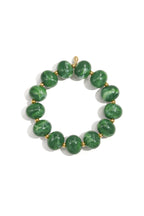 Elastic beaded bracelet with large beads