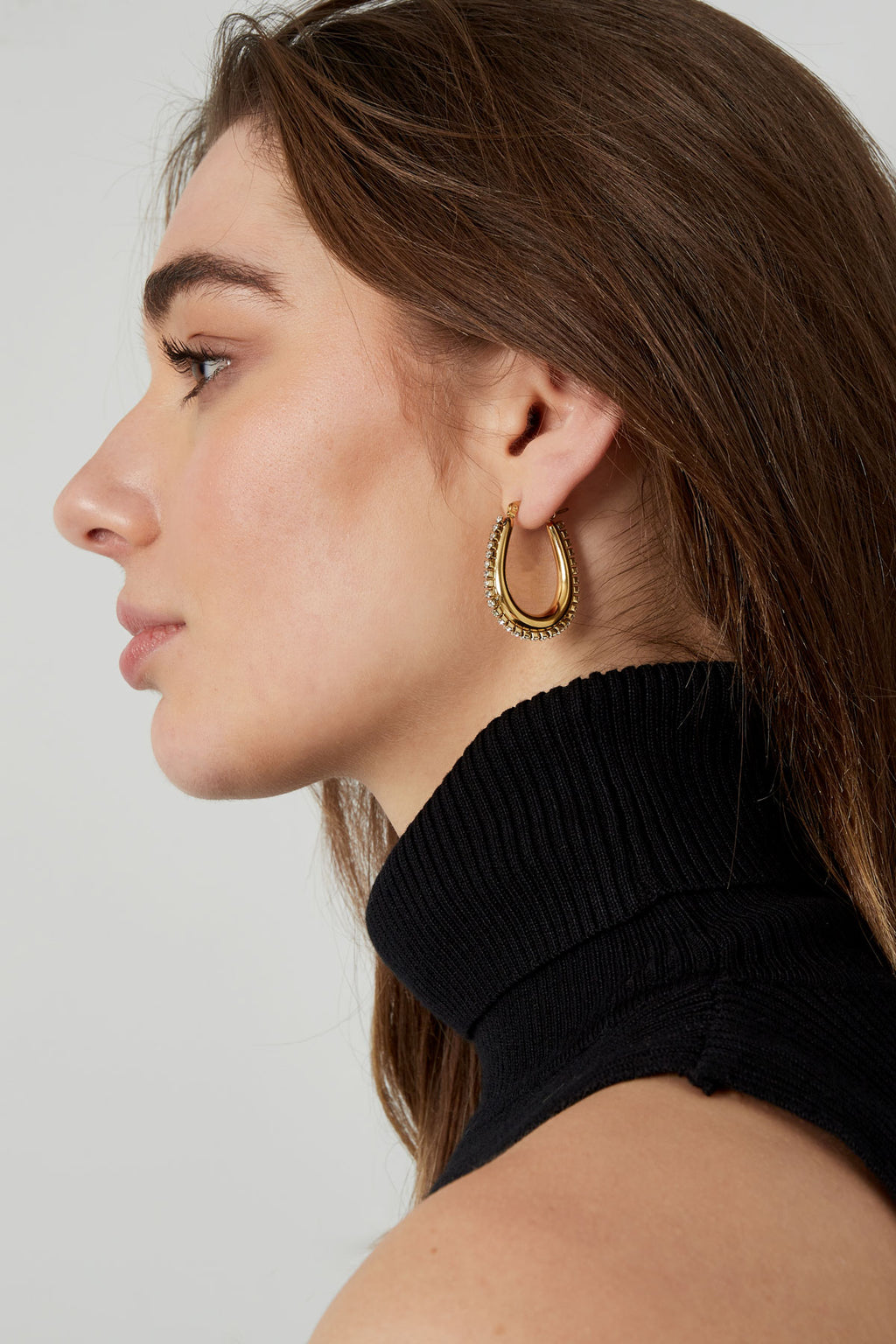 drop shaped earrings with stones
