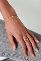 bracelet with heart and diamond charms