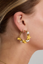 Hoop earrings with starfish and gold beads