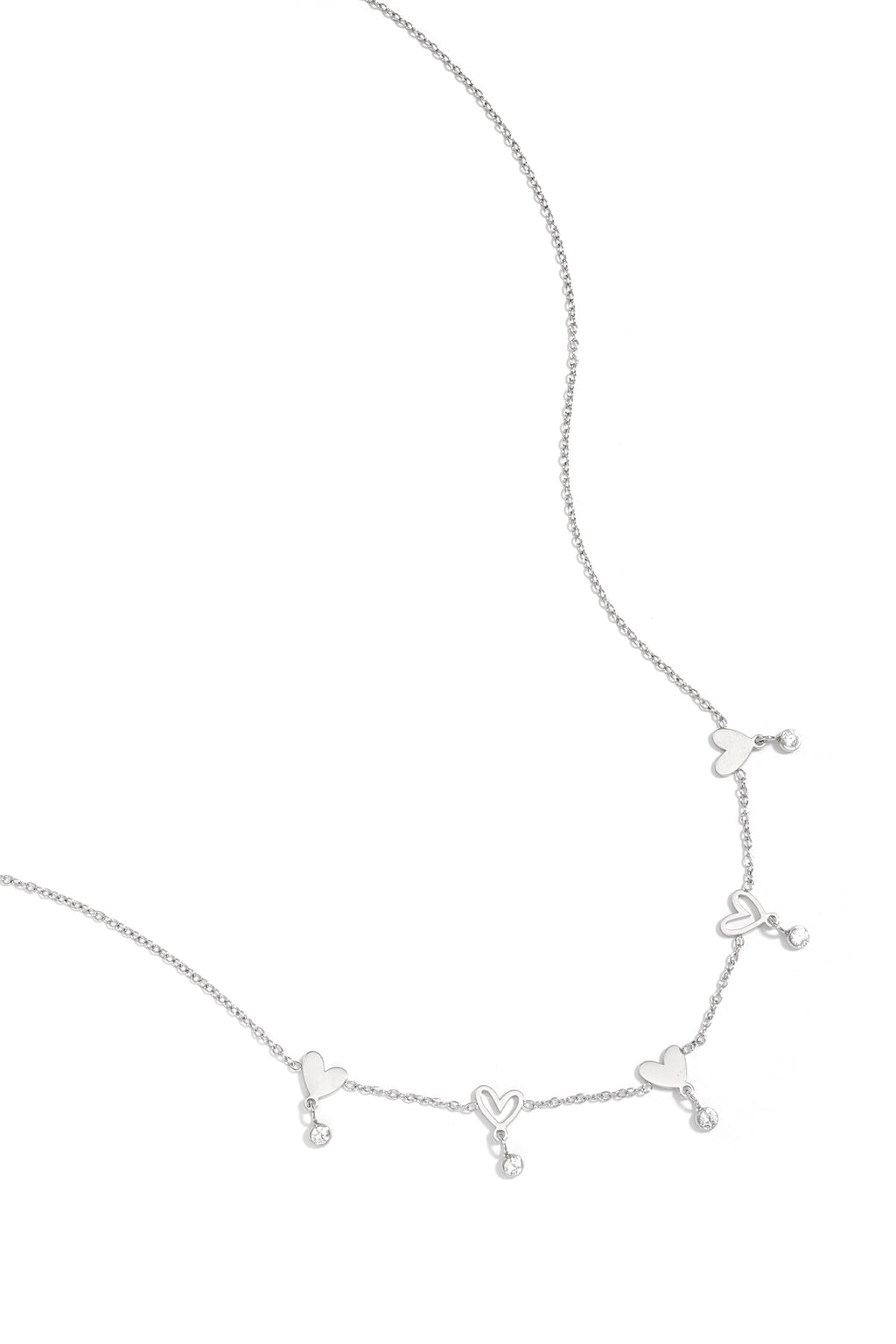 Necklace with alternating hearts and dangling stones