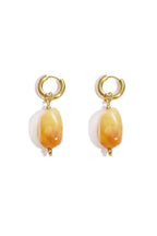 Earrings with organic beads