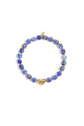 Beaded bracelet with heart-shaped centerpiece