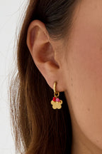 Earrings with hanging flower and beads