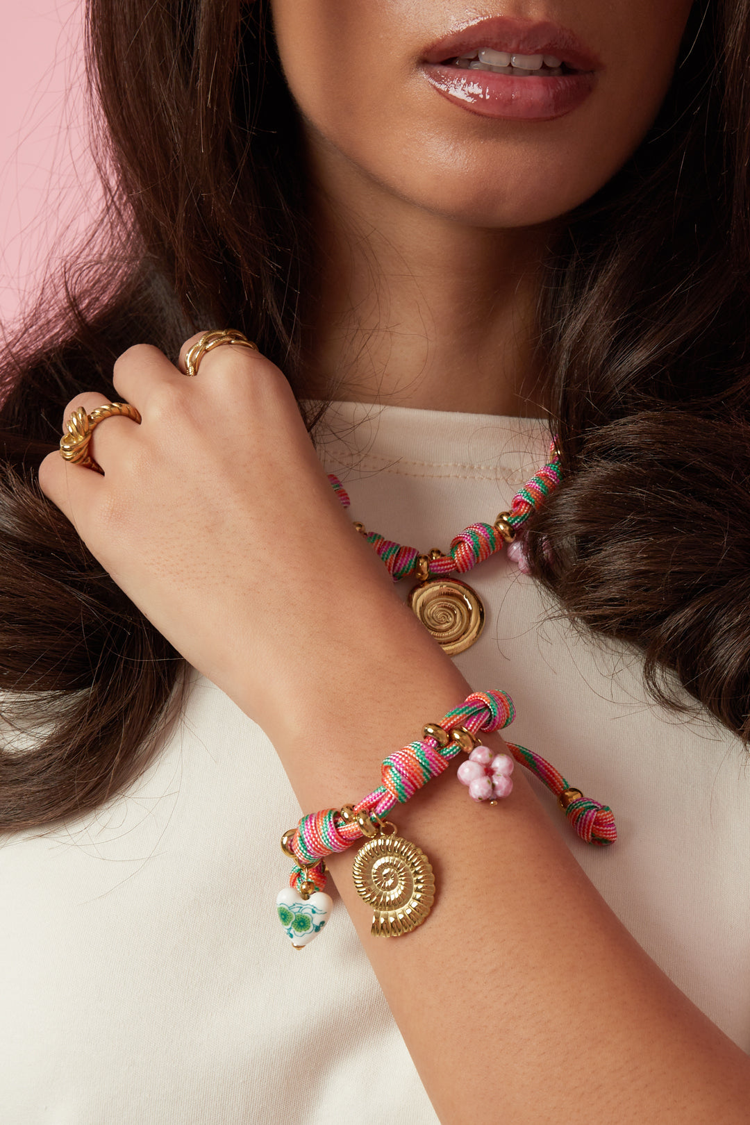 Rope bracelet with knots and shell charms