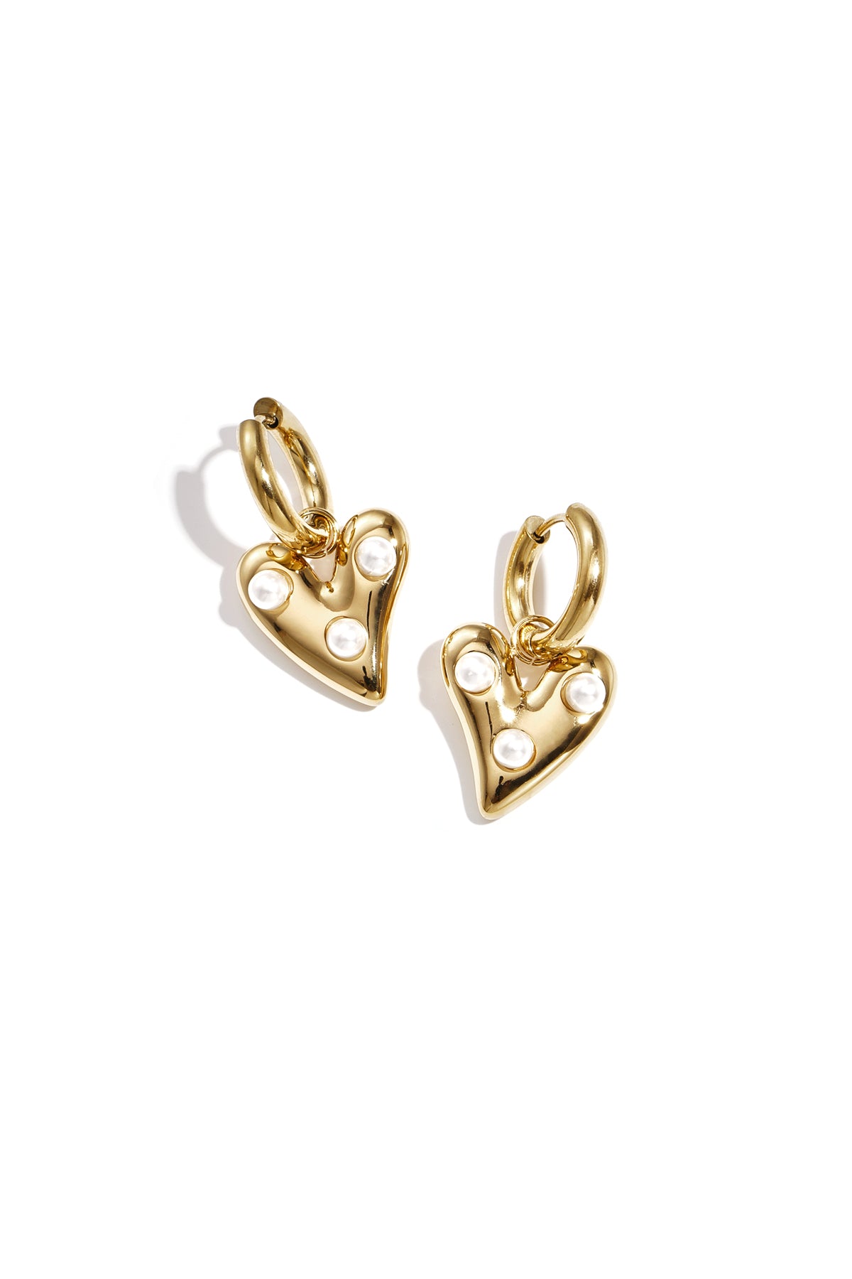 Hoop earrings with hanging heart and pearls