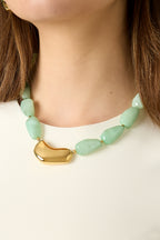 Necklace with asymmetric statement bead