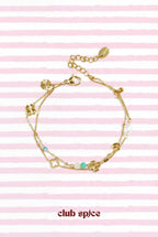 Bracelet with clover, beads and stones