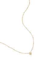 Necklace with beads and shooting star