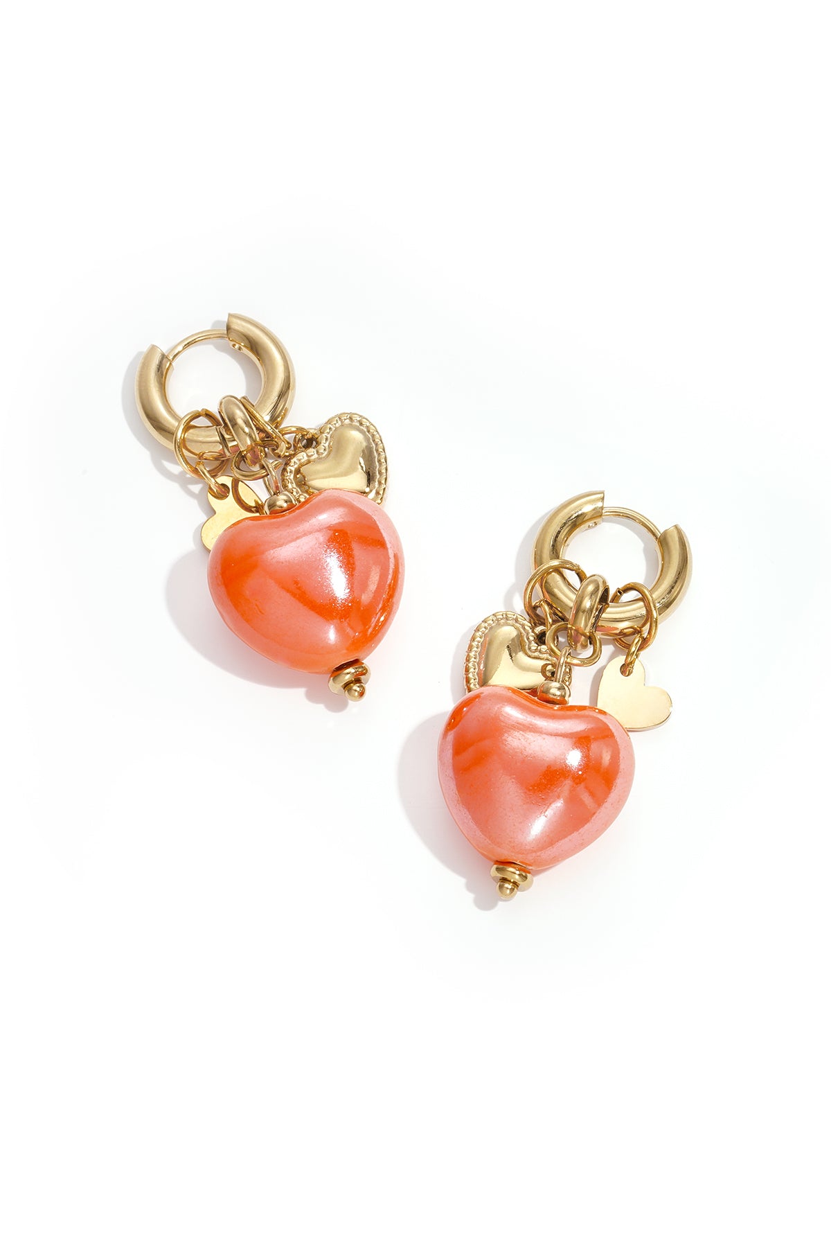 Earrings with heart pendants