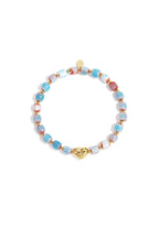 Beaded bracelet with heart-shaped centerpiece