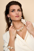 Necklace with shells, sea charms and gold beads