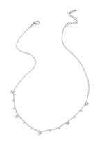 Necklace with alternating balls