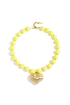 Bead necklace with hanging heart