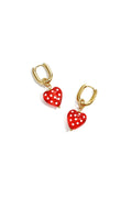 Earrings with dangling hearts with dots