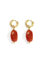 Earrings with organic beads
