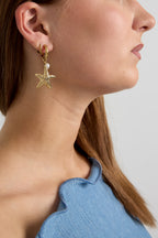 Earrings with starfish and pearl