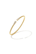 Symmetrically dotted bangle with detailed ends