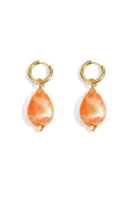Earrings with asymmetrical bead