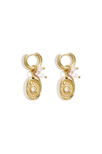 Earrings with beads and shell charm