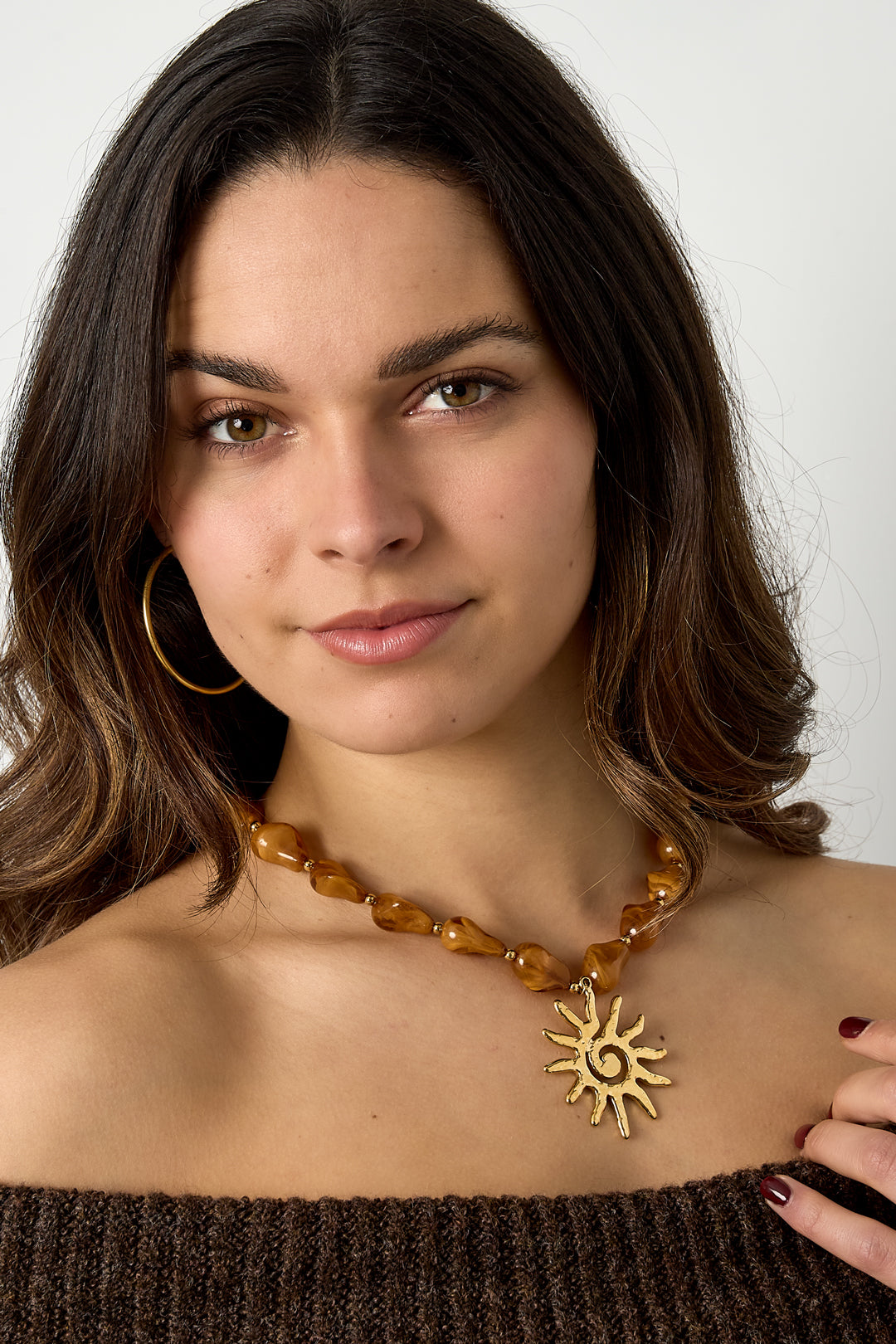 Bead necklace with sun charm