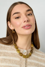 Necklace with squoval beads