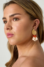 Earrings with shell-shaped pendants and beads