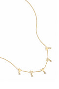 Necklace with alternating hearts and dangling stones