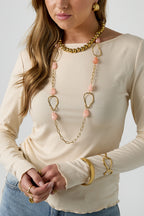 Long necklace with various beads and stones