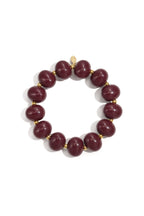Elastic beaded bracelet with large beads